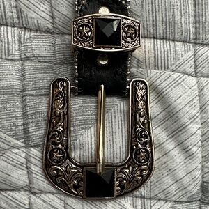 Elegant Black and Gold Belt with Intricate Buckle